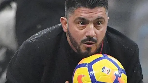 AC Milans head coach Gennaro Gattuso catches a ball during the Serie A soccer match between AC Milan and FC Crotone at the Giuseppe Meazza stadium in Milan, Italy, 6 January 2018. Ansa/Daniel Dal Zennaro