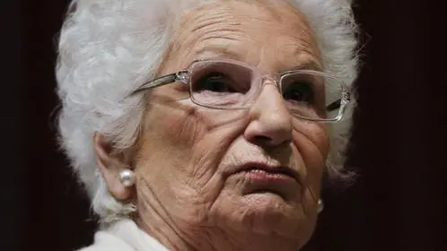 Holocaust survivor Liliana Segre speaks with young students on the occasion of an Holocaust remembrance, at the Arcimboldi theatre in Milan, Italy, Wednesday, Jan. 24, 2018. Segre, a senator for life, unwittingly provoked one of Italys most intense confrontations with anti-Semitism since the fall of the Fascist dictatorship when she proposed a motion to create a parliamentary commission against anti-Semitism which the center-right abstained from voting. (ANSA/AP Photo/Luca Bruno) [CopyrightNotice: Copyright 2018 The Associated Press. All rights reserved.]