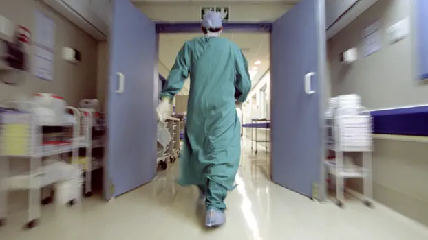 Doctor rushing in hallway