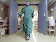 Doctor rushing in hallway