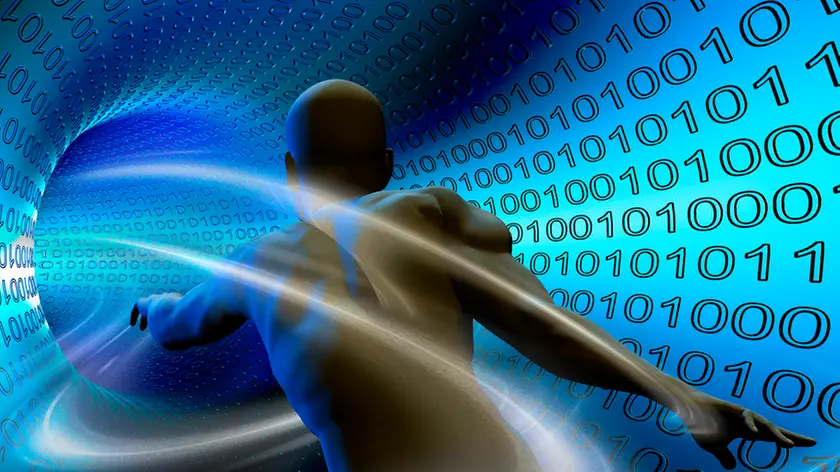 Man Running in Digital Vortex --- Image by © Mike Agliolo/Corbis