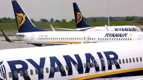 epa04601145 (FILE) A file picture dated 10 May 2007 shows a Ryanair planes at Dublin airport in Dublin, Ireland. Irish budget carrier Ryanair revised upward its full-year profit forecast 02 February 2015, citing lower fuel costs and higher passenger numbers. This is the fourth time the no-frills airline has upped its profit outlook for the fiscal year, which ends in March. Ryanair, which this year marks the 30th anniversary of its founding, now expects to earn 840 million euros to 850 million euros (951 million dollars to 962 million dollars) in annual profit. In May, it had estimated profit at 580 million to 620 million euros. The fall in oil prices is expected to contribute to a 5-per-cent reduction in costs, Ryanair said. EPA/ANDY RAIN