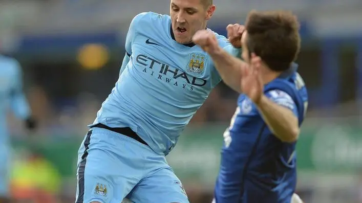 epa04553706 Manchester City's Stevan Jovetic (L) in action with Everton's Leighton Baines (R) during the English Premier League soccer match between Everton FC and Manchester City at the Goodison Park in Liverpool, Britain, 10 January 2015. EPA/PETER POWELL DataCo terms and conditions apply .http://www.epa.eu/files/Terms%20and%20Conditions/DataCo_Terms_and_Conditions.pdf