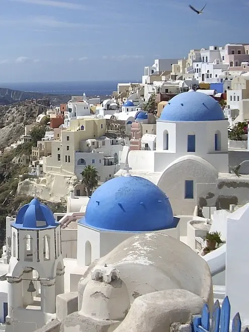 This Sept. 21, 2009 photo shows a view of Oia village on the island of Santorini, Greece. The Greek island of Santorini offers seaside tavernas, cliffside paths, black volcanic rocks and of course, sunshine and the Aegean. (AP Photo/Michael Virtanen)