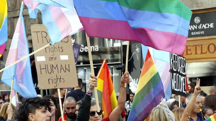 epa07827626 Participants carry placards and rainbow colored flags during Sarajevo's first-ever gay pride parade, in Sarajevo, Bosnia and Herzegovina, 08 September 2019. Representatives of LGBT (Lesbian, Gay, Bisexual and Transgender) organisations and their supporters took part in the event that also commemorates the 50th anniversary of the so-called Stonewall Riots in New York City, USA, when a police raid at the Stonewall Inn in Greenwich Village in 1969 sparked riots that were leading to the gay liberation movement. EPA/FEHIM DEMIR