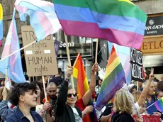 epa07827626 Participants carry placards and rainbow colored flags during Sarajevo's first-ever gay pride parade, in Sarajevo, Bosnia and Herzegovina, 08 September 2019. Representatives of LGBT (Lesbian, Gay, Bisexual and Transgender) organisations and their supporters took part in the event that also commemorates the 50th anniversary of the so-called Stonewall Riots in New York City, USA, when a police raid at the Stonewall Inn in Greenwich Village in 1969 sparked riots that were leading to the gay liberation movement. EPA/FEHIM DEMIR