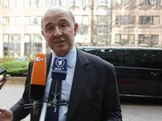 epa04118905 French Finance Minister Pierre Moscovici speaks to journalists as he arrives for a Eurogroup Finance Ministers meeting at the EU council headquarters in Brussels, Belgium, 10 March 2014. The Eurogroup is to discuss Winter 2014 European economic forecast by the European Commission, European Stability Mechanism (ESM) direct bank recapitalization instrument and economic adjustment programme in Cyprus, Greece and Portugal. EPA/JULIEN WARNAND