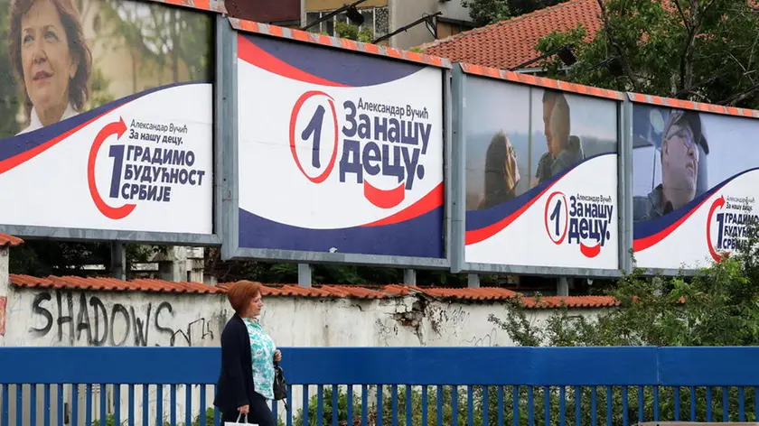 epa08490482 A woman carrying a shopping bag walks past a row of campaign billboards of the ruling Serbian Progressive Party (SNS) of incumbent President Aleksandar Vucic ahead of the upcoming parliamentary elections, in Belgrade, Serbia, 17 June 2020. The Western Balkan nation's voters are set to choose their representatives in the 250-seat National Assembly on 21 June. The balloting was originally scheduled for 26 April, but it was postponed due to the state of emergency declared in a bid to contain the spread of the ongoing pandemic of the COVID-19 disease caused by the SARS-CoV-2 coronavirus. The ruling SNS-led big tent coalition – named 'For Our Children' – currently holds a majority of 131 seats in the National Assembly and 63 out of 120 seats in the unicameral legislature of the autonomous province of Vojvodina. EPA/KOCA SULEJMANOVIC