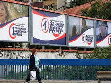 epa08490482 A woman carrying a shopping bag walks past a row of campaign billboards of the ruling Serbian Progressive Party (SNS) of incumbent President Aleksandar Vucic ahead of the upcoming parliamentary elections, in Belgrade, Serbia, 17 June 2020. The Western Balkan nation's voters are set to choose their representatives in the 250-seat National Assembly on 21 June. The balloting was originally scheduled for 26 April, but it was postponed due to the state of emergency declared in a bid to contain the spread of the ongoing pandemic of the COVID-19 disease caused by the SARS-CoV-2 coronavirus. The ruling SNS-led big tent coalition – named 'For Our Children' – currently holds a majority of 131 seats in the National Assembly and 63 out of 120 seats in the unicameral legislature of the autonomous province of Vojvodina. EPA/KOCA SULEJMANOVIC