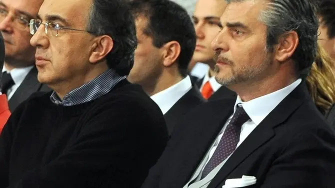 A handout picture provided by the Ferrari Press Office on 28 January 2011 shows (L-R) Brazilian Formula One driver Felipe Massa, Ferrari team principal Stefano Domenicali, Spanish Formula One driver Fernando Alonso, Fiat Chairman John Elkann, Ferrari president Luca Cordero di Montezemolo, Grupo Santander Executive chairman Emilio Botin, Fiat CEO Sergio Marchionne and Maurizio Arrivabene, senior figure inside Philip Morris' motorsports sponsoring arm and responsible for the Marlboro sponsorship of the Ferrari F1 team, during the official presentation of the new Ferrari's Formula One car 'F150' in Maranello, Italy, 28 January 2011. The new racer is named 'F150' to commemorate the 150th anniversary of Italy's unification. ANSA/FERRARI PRESS OFFICE HANDOUT EDITORIAL USE ONLY/NO SALES