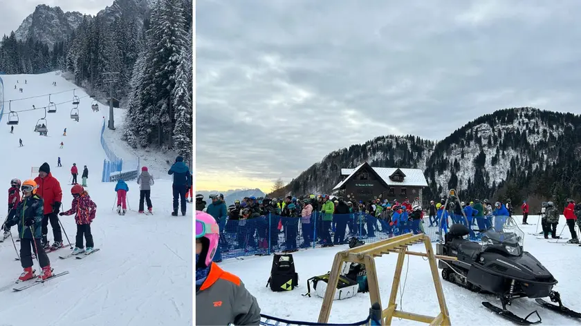 Sciatori sulle piste a Sappada, a destra le prime code agli impianti di risalita sullo Zoncolan