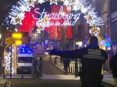 In this image made from video, emergency services arrive on the scene of a Christmas market in Strasbourg, France, Tuesday, Dec. 11, 2018. A French regional official says that a shooting in Strasbourg has left at least one dead and several wounded in the city center near a world-famous Christmas market. The prefect of France's Bas-Rhin region says the gunman, who is still at large, has been identified. Authorities haven't given a motive for the shooting. (ANSA/AP Photo)