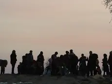 epa05032962 Migrants from Syria, Iraq and Afghanistan cross the border between Serbia and Macedonia near the village of Miratovac, travelling on foot from Macedonia to south Serbian city of Presevo in Serbia, 19 November 2015. Countries on the Balkan migration route agreed to carry out joint measures aiming to stem the flow of refugees across their soil and step up supervision and security. A conference of interior ministry officials from Greece, Macedonia, Serbia and Slovenia agreed to enhance identification, supervision and data sharing in order to improve accommodation planning and security. Beginning from the Turkish coast, migrants take boats to the Greek islands and mainland, before heading to Macedonia and then Serbia. Some then travelled through Hungary and on to Austria, but after Hungary sealed its border, the path of choice became Croatia, Slovenia and then Austria. EPA/DJORDJE SAVIC