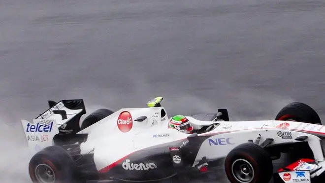 epa02965692 Mexican Formula One driver Sergio Perez of the Sauber F1 Team steers his car under the rain during the first practice session at the Korean International Circuit in Yeongam, South Korea, 14 October 2011. The Formula One Grand Prix of South Korea will take place on 16 October 2011. EPA/DIEGO AZUBEL