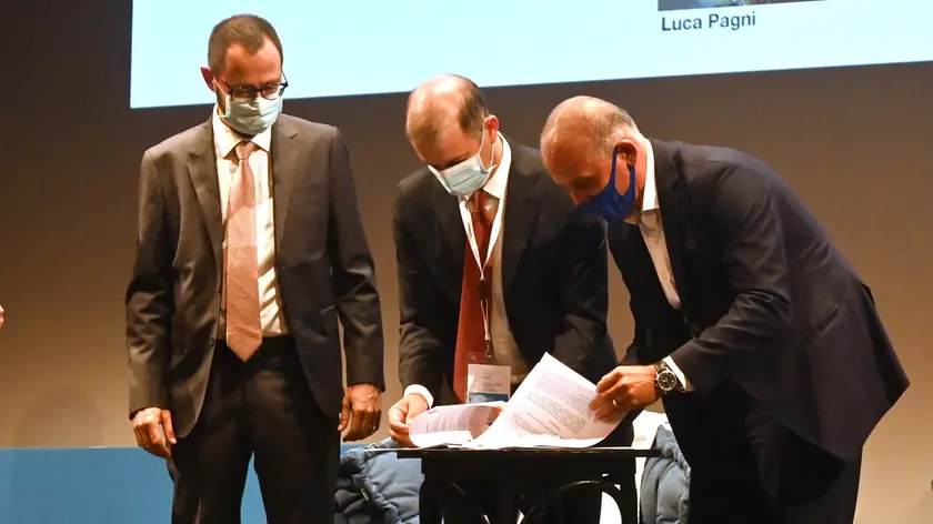 A Trieste Next la firma del protocollo Luca Pagni e Marco Averà alla presenza del ministro Patuanelli