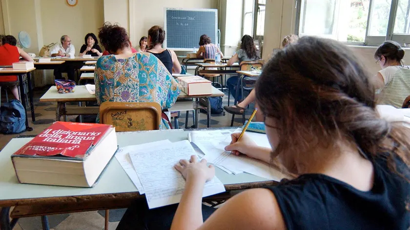 18/06/03 SCUOLA LICEO SCIENTIFICO RIGHI ESAMI DI MATURITA' PROVA SCRITTA DI ITALIANO .