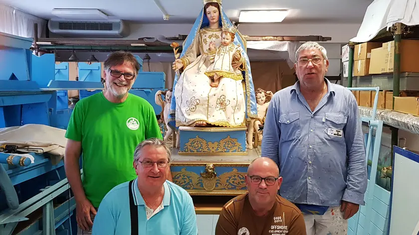 Nelle foto Boemo i restauratori della storica Madonna: Maurizio Tognon, Giovanni Marchesan, Francesco Marocco e Adelchi Quargnali