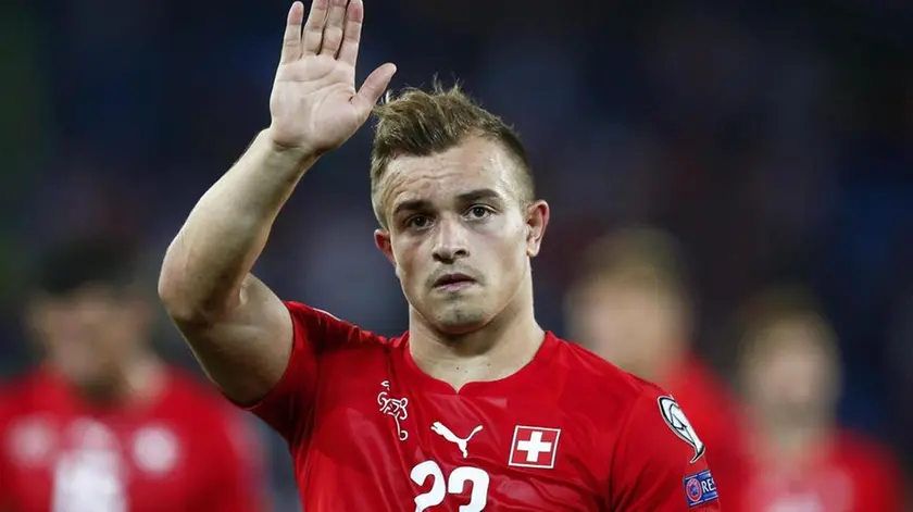 Swiss forward Xherdan Shaqiri waves to supporters as he leaves the pitch after the UEFA EURO 2016 qualifying soccer match between Switzerland and England at the St. Jakob-Park stadium in Basel, Switzerland, 08 September 2014. ANSA/PETER KLAUNZER