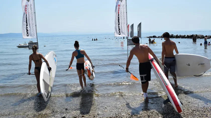 Sup e surf in mare