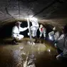 Un gruppo di tecnici controlla le gallerie sottostanti via Carducci dove scorre il torrente Chiave