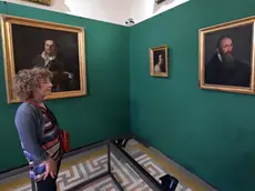 La mostra allestita con i quattro dipinti (Bruni)