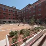 Lo spazio interno dell’ex Stock a Roiano con il nuovo giardino e l’edificio di Generali Foto Andrea Lasorte