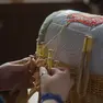 Un frame del cortometraggio dedicato al merletto goriziano