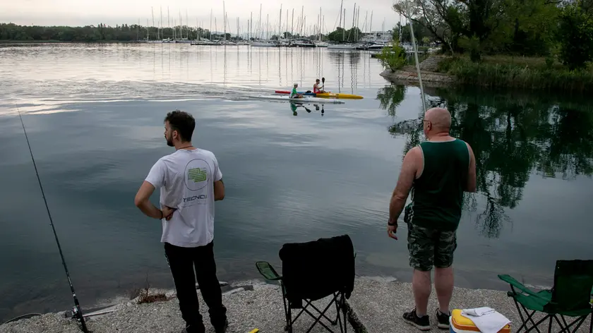 Due pescatori sul canale del Brancolo (Bonaventura)