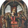 La pala, datata 1518, che rappresenta la Madonna col Bambino circondata da un coro di santi