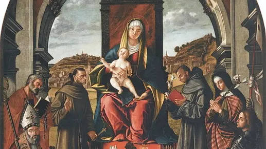 La pala, datata 1518, che rappresenta la Madonna col Bambino circondata da un coro di santi
