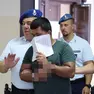 Usama Usama in tribunale a Trieste, scortato dagli agenti della penitenziaria foto Lasorte