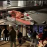 In alto un migrante che riposa nei pressi della stazione e alcuni dei richiedenti asilo invitati ad andare via dal porticato di Selva Arredamenti nelle immagini postate da Cisint
