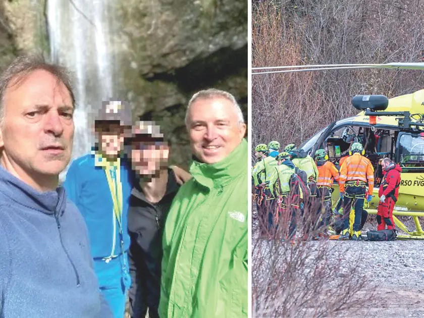 Mauro Darpin (a sinistra) e Sandro Valent (a destra) con amici e i soccorritori a Enemonzo