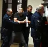 Hasan Uzun portato in Tribunale dalle guardie carcerarie (Bruni)