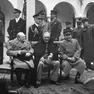 Seduti da sinistra Winston S. Churchill, Franklin D. Roosevelt e Josef Stalin nel febbraio 1945 a Yalta. Foto Ansa