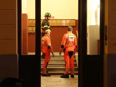 I soccorritori intervenuti nella palazzina di via Crispi 5 la sera della tragedia Foto Andrea Lasorte