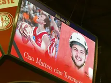 Il tabellone con le immagini di Matteo e Tommaso Foto Bruni