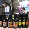 Uno degli stand con le sue bottiglie a Olio Capitale Foto Andrea Lasorte