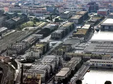 Uno scatto areo dei magazzini del Porto Vecchio, a Trieste, dove saranno trasferiti gli uffici della Regione (archivio Lasorte)