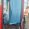 La vetrata danneggiata del Caffè Le Merende in via Carducci