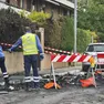 La pulizia di via Puccini dopo il rogo del camper Foto Lasorte