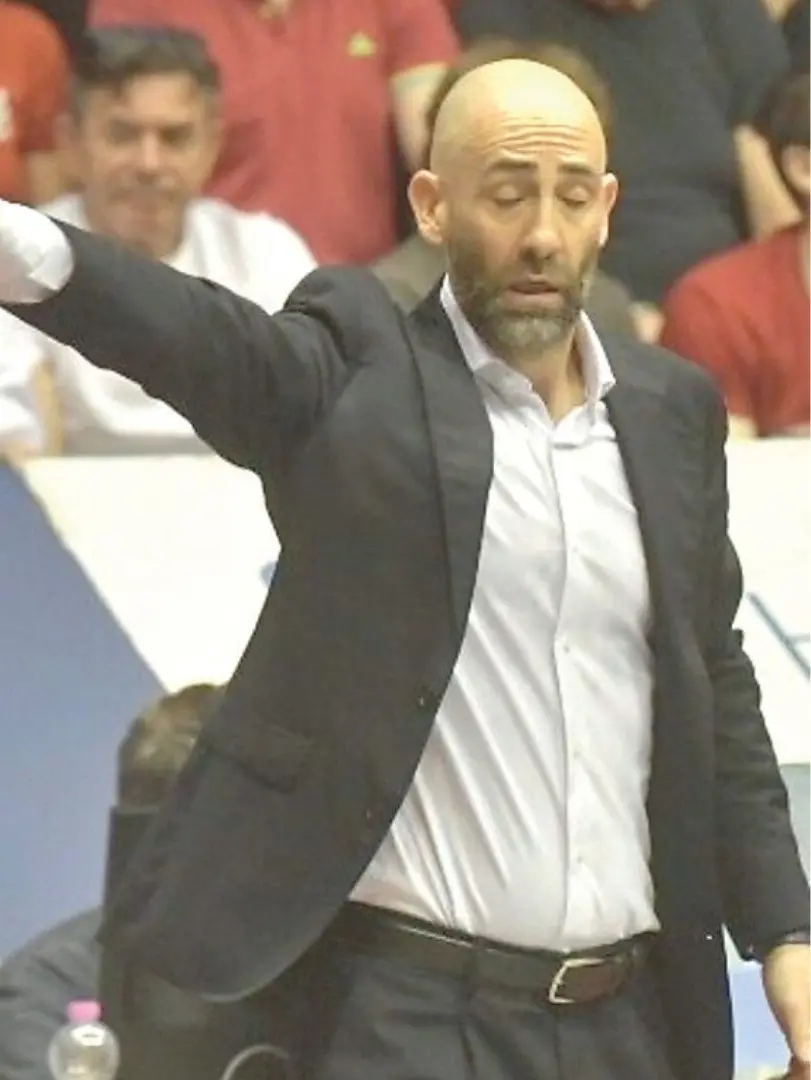Juan Toscano Anderson e, a destra, il coach biancorosso Francesco Taccetti (foto Bruni)