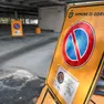 I cartelli nel parcheggio di via Manzoni (Tibaldi)