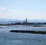 Il canale di Barbana interessato ai dragaggi con il santuario sullo sfondo