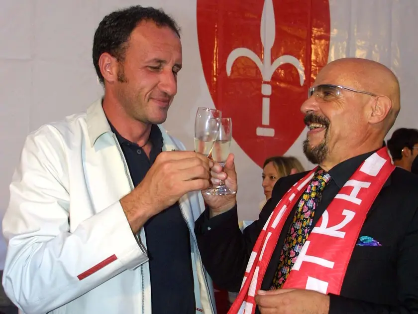 Ezio Rossi con Amilcare Berti brindano a Trieste dopo il trionfo di Lucca (foto archivio Lasorte)