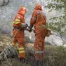 Pompieri in azione sul Carso in una foto di archivio