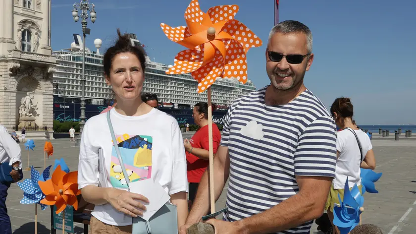 https://images.ilpiccolo.it/view/acePublic/alias/contentid/1s8s5eqgymvgb0bltmf/0/copia-di-piazza-unita-boramata-asta-delle-girandole.webp?f=16%3A9&amp;w=840