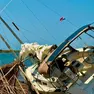Alcune delle barche strappate agli ormeggi e spiaggiate sull’isola di Unie