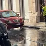 Le pulizie in strada dopo il nubifragio che ha colpito Trieste domenica sera