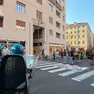 I manifestanti vicino alla Questura blindata dagli agenti anti-sommossa (Silvano)